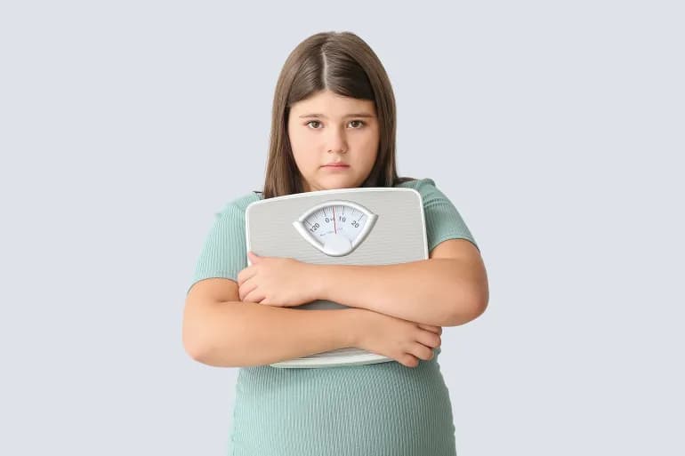 Votre guide pour gérer la prise de poids de votre enfant sans affecter son image de soi