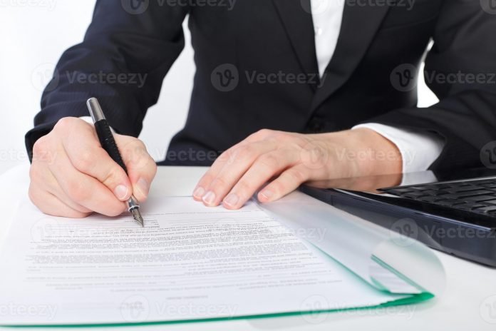 991200-signature-de-l-accord-photo